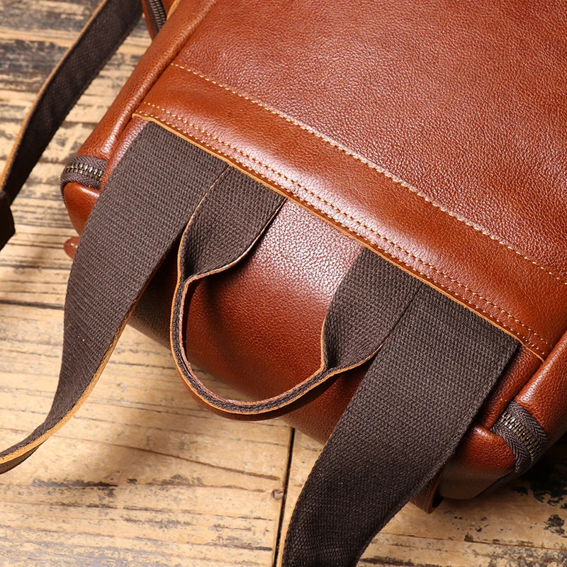 Tall leather rucksack with top flap