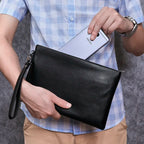 Leather clutch with wrist strap