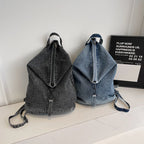 Washed denim backpack with adjustable straps