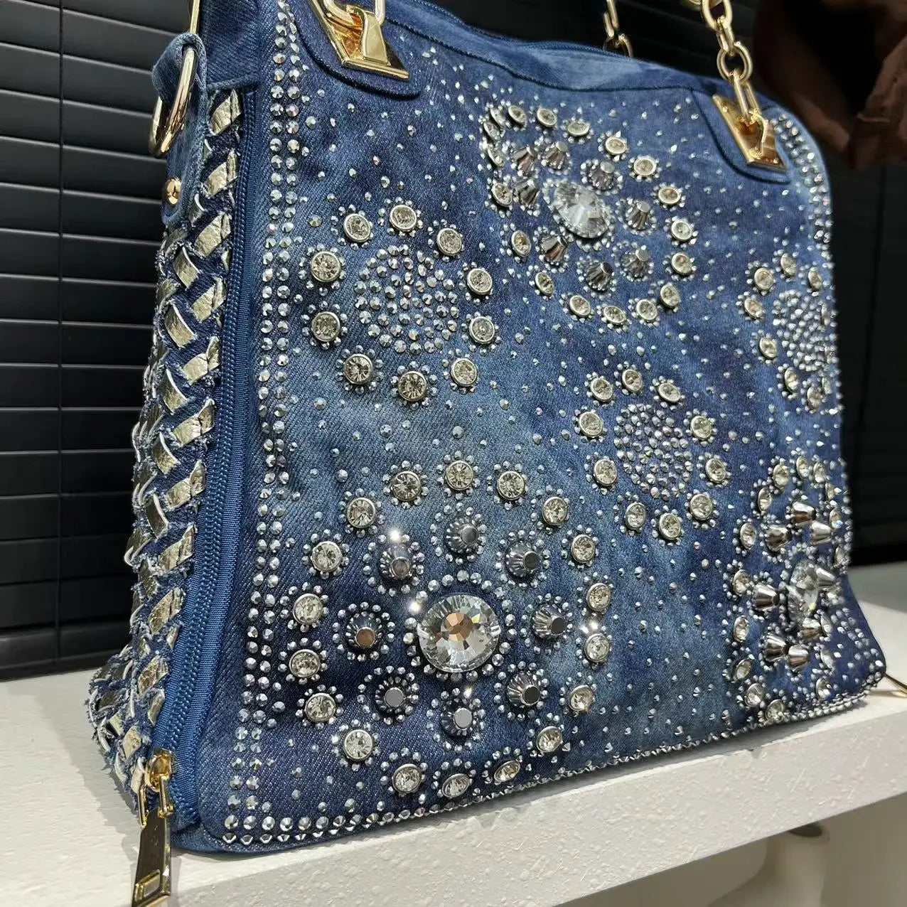 Elegant floral embroidered denim handbag with chain handle