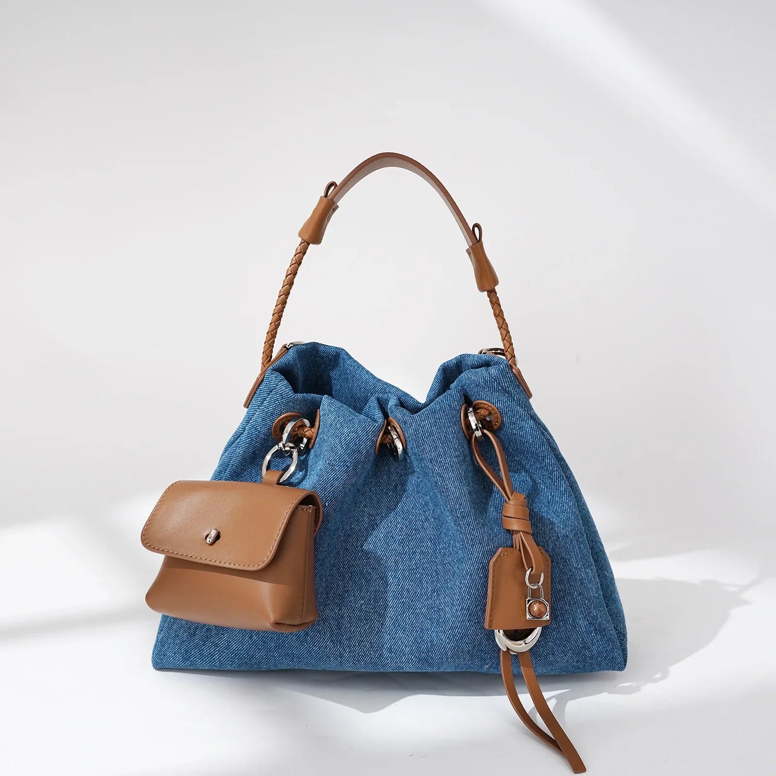 Denim handbag with external pockets
