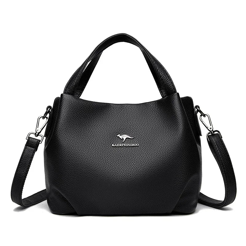 Leather handbag with wide base