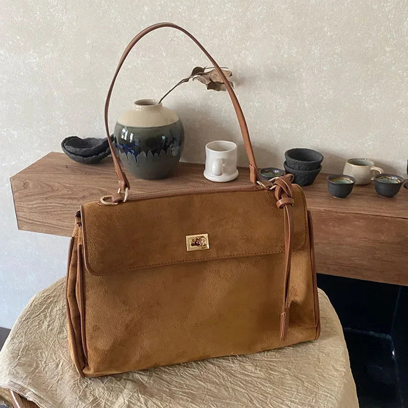 Structured modern suede handbag