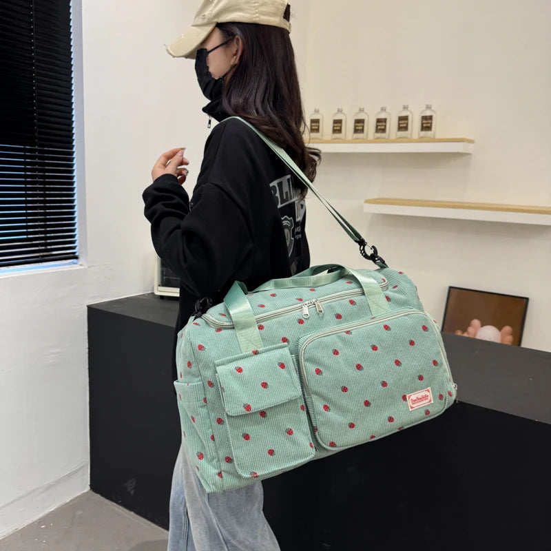 Corduroy travel toiletry bag with shoulder strap