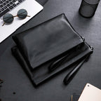 Leather clutch with wrist strap