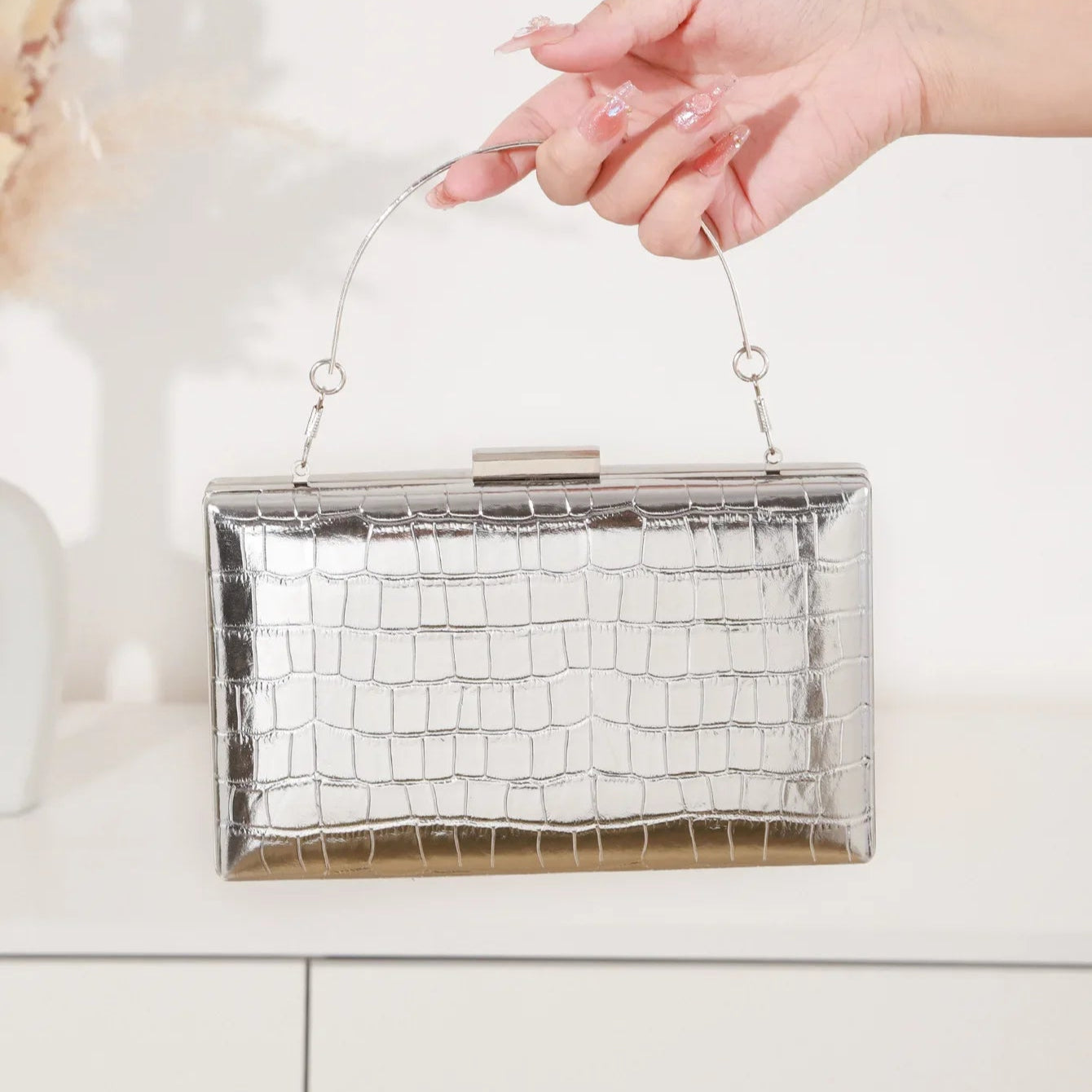 Leather handbag with structured silhouette