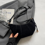 Crescent suede hobo bag