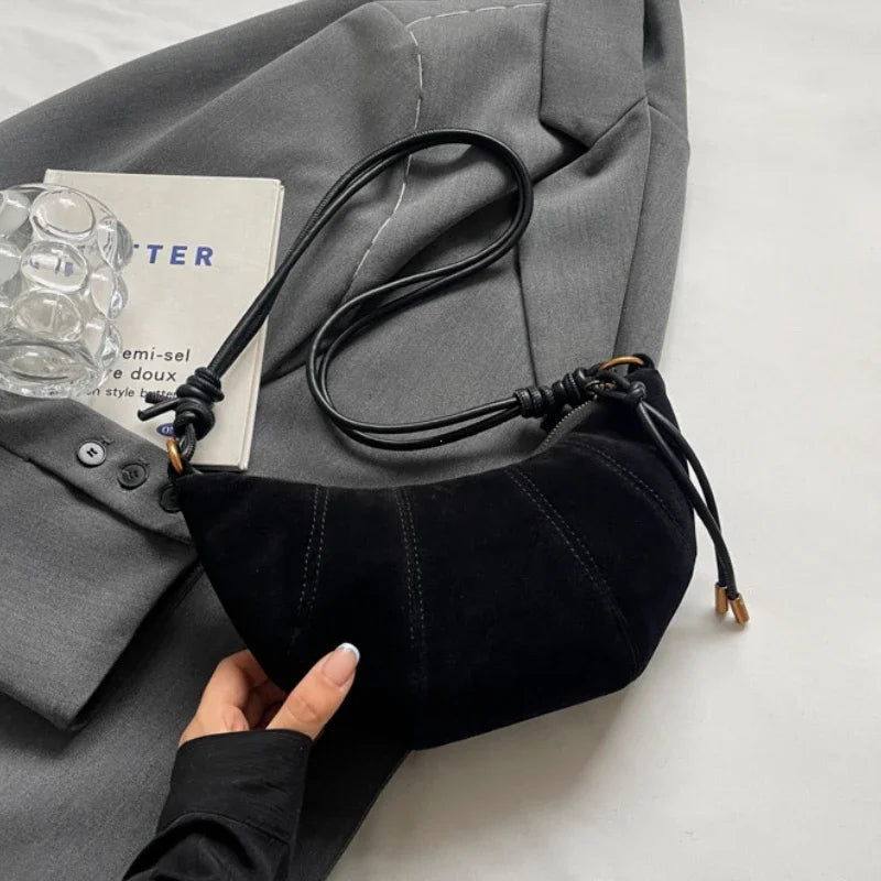 Crescent suede hobo bag