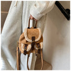 Suede backpack with front pockets