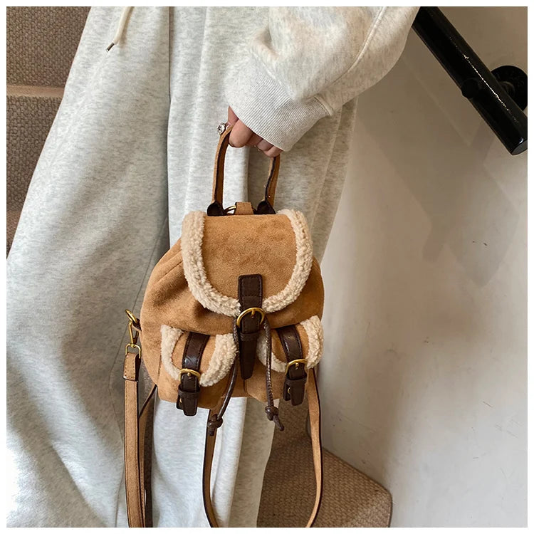 Suede backpack with front pockets