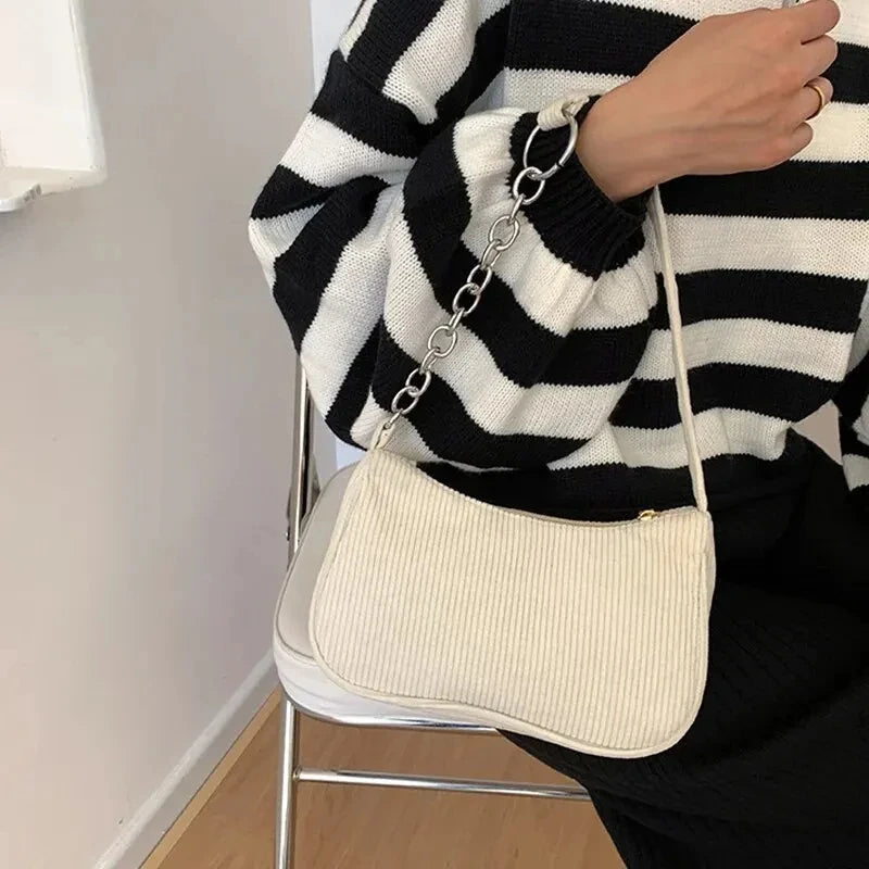 Soft corduroy handbag with single strap