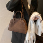 Suede handbag with shoulder strap