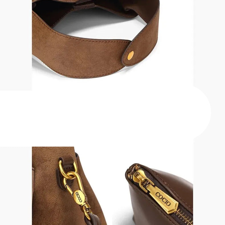 Suede handbag with rounded handles and zip closure