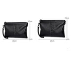 Minimalist leather clutch with detachable strap