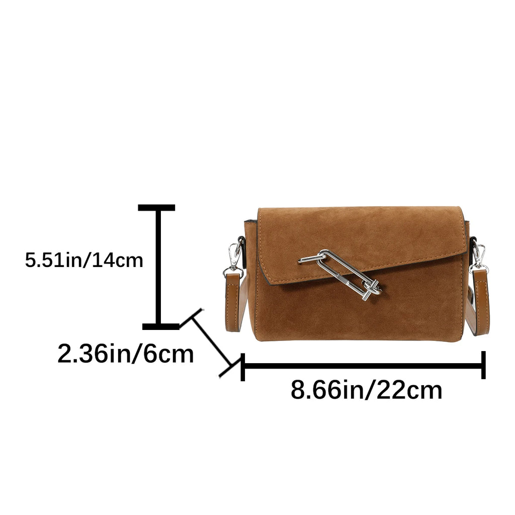 Structured suede handbag with minimalist shape