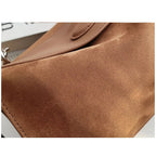 Suede handbag with subtle colors