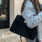 Structured modern suede handbag
