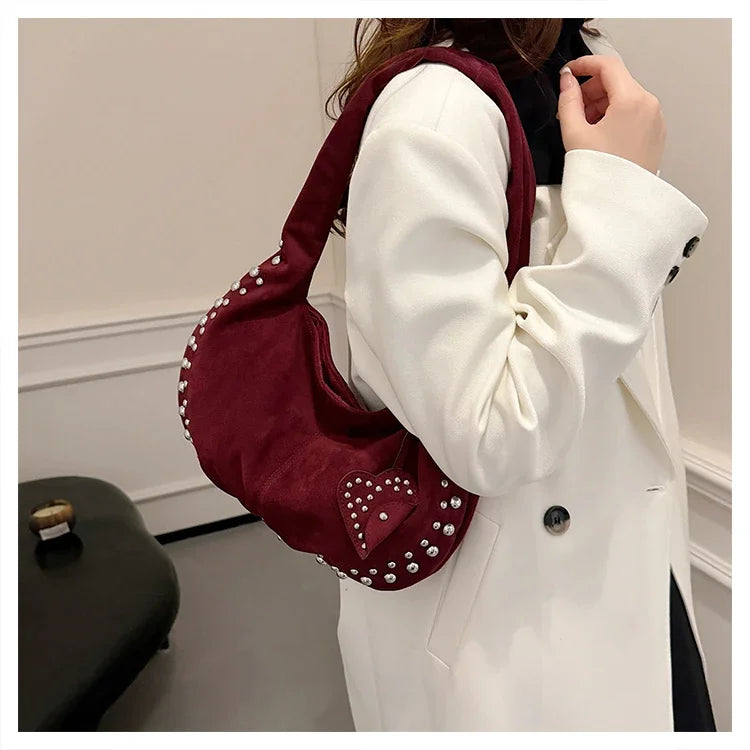 Chic suede shoulder bag with decorative strass