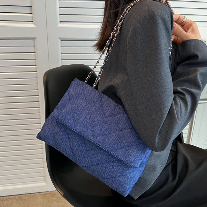 Flap-style denim shoulder handbag