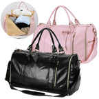 Elegant leather holdall with shoulder strap