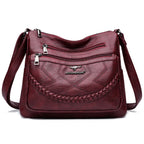 Leather shoulder bag with adjustable strap