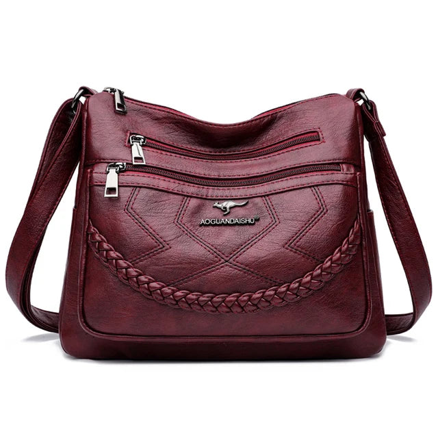 Leather shoulder bag with adjustable strap