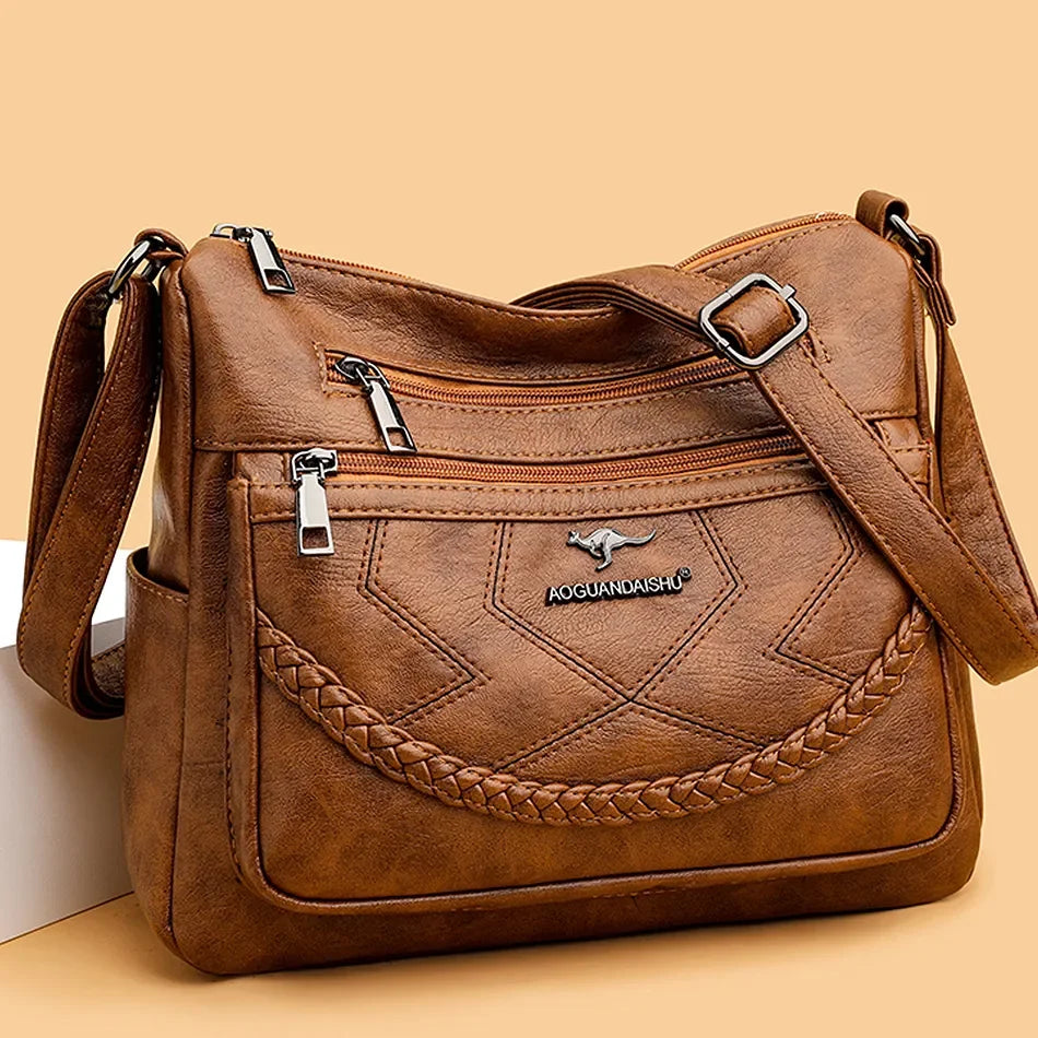 Leather shoulder bag with adjustable strap