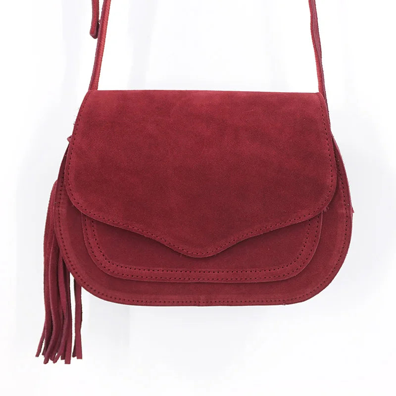 Fold-over suede shoulder bag