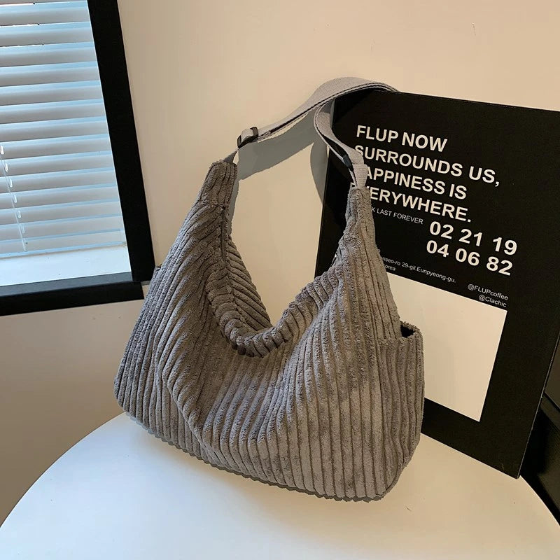 Versatile corduroy handbag with shoulder strap