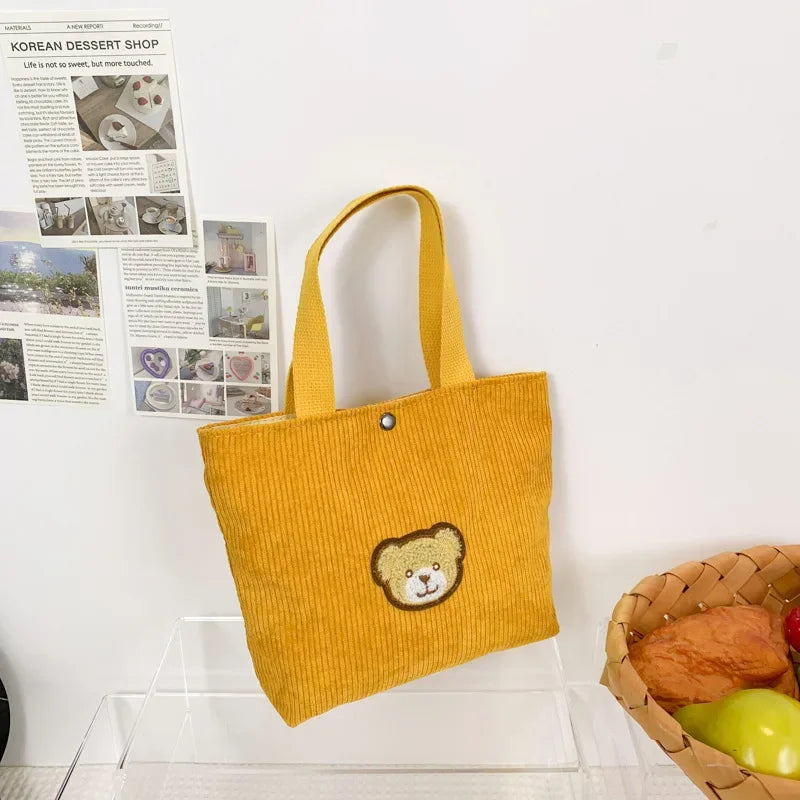 Women’s corduroy shoulder tote bag with front patch