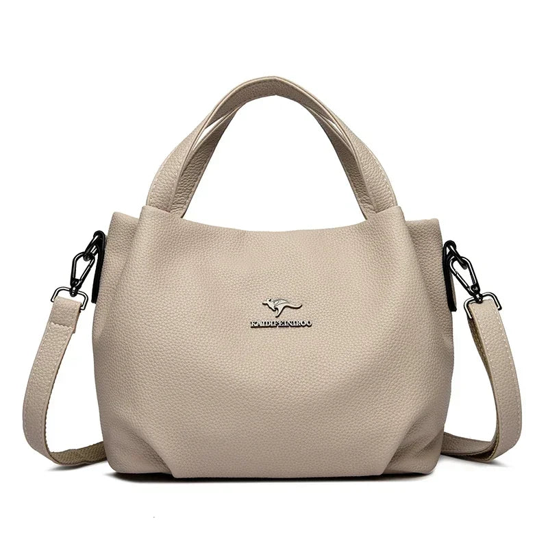Leather handbag with wide base
