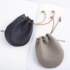 Pocket-size leather pouch