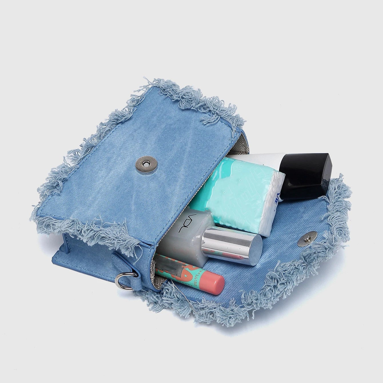Mini denim handbag with frayed trim