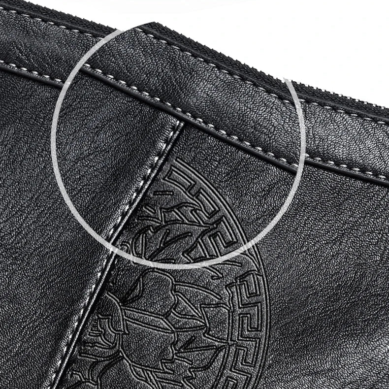 Minimalist leather clutch with detachable strap