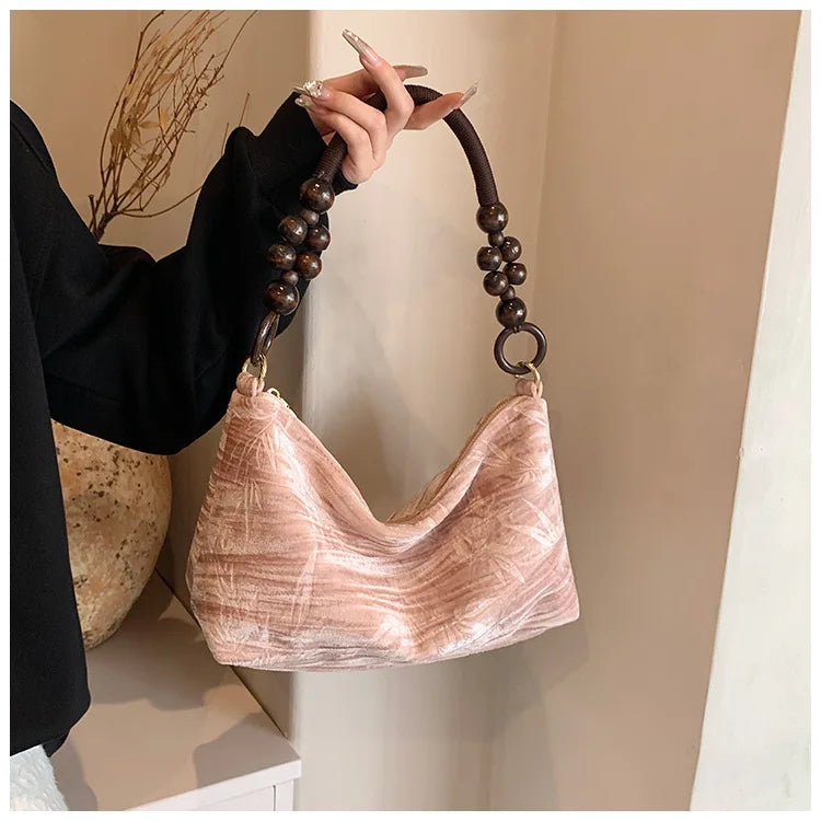 Corduroy handbag with wooden bead handle