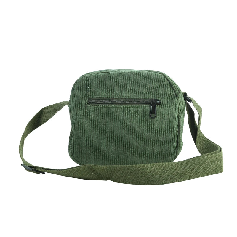 Small corduroy handbag with front zipper pocket