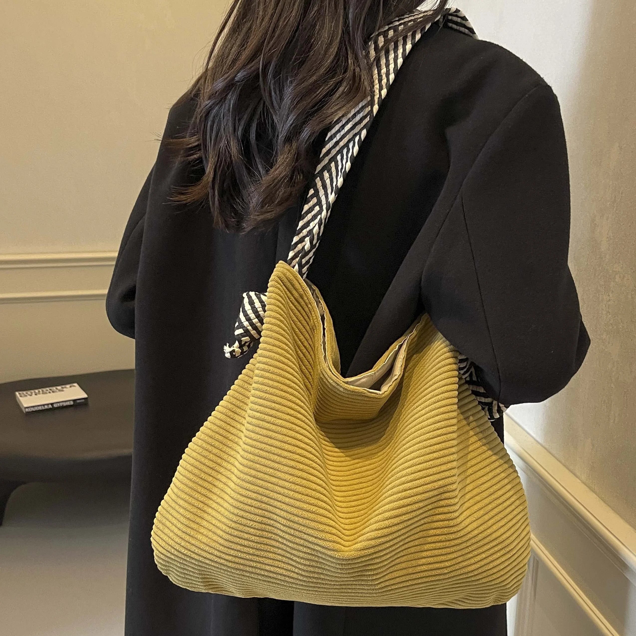 Corduroy handbag with wide shoulder strap