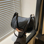 Shiny leather hobo bag