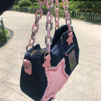 Denim handbag with star patches