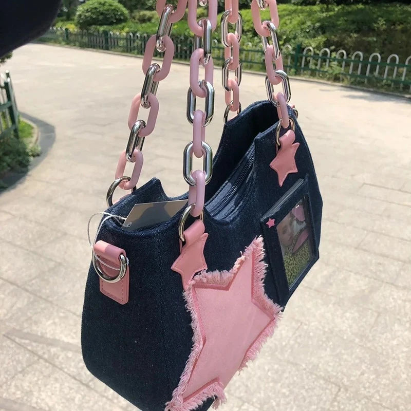 Denim handbag with star patches