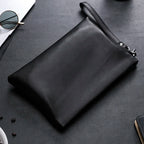 Leather clutch with wrist strap