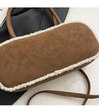 Elegant suede handbag with vintage charm