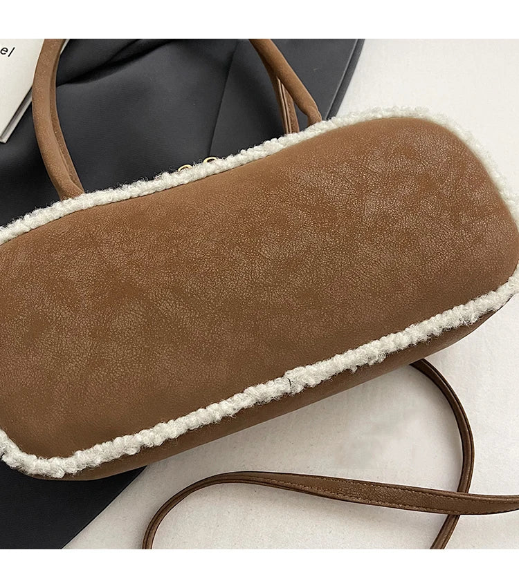 Elegant suede handbag with vintage charm