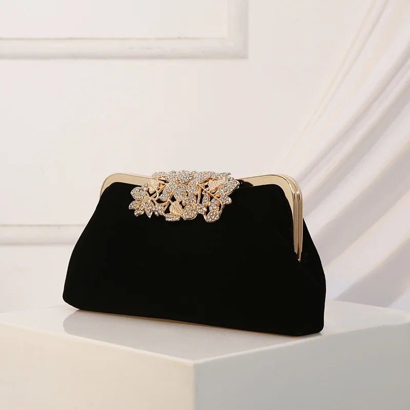 Corduroy clutch bag with decorative closure