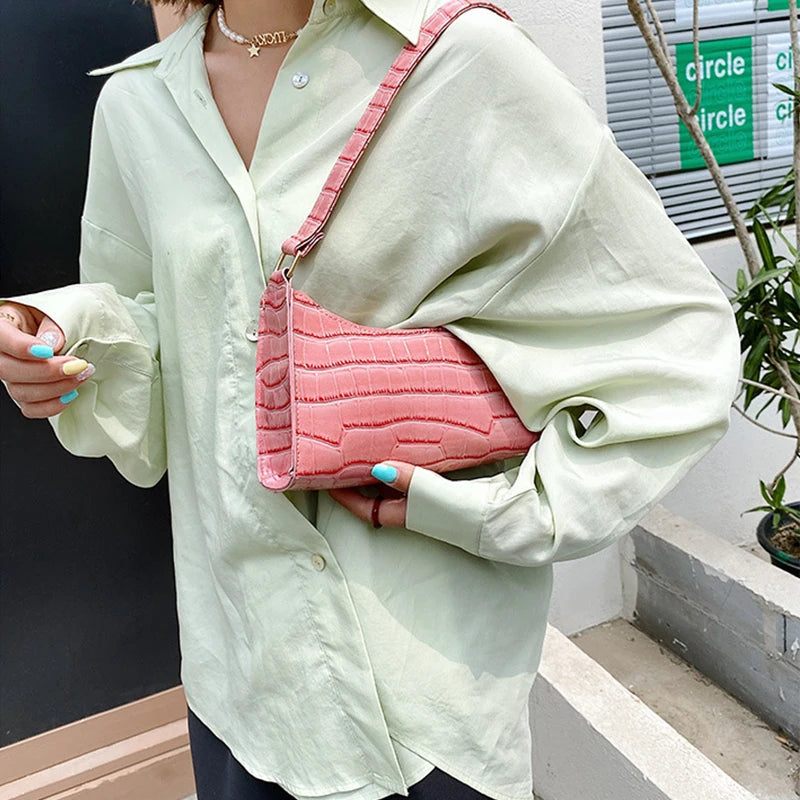 Small leather sling pouch