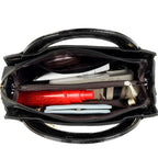 Soft leather handbag with curved top edge