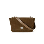 Textured suede handbag with flap closure