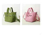 Designer-inspired suede handbag