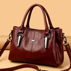Leather handbag with detachable shoulder strap