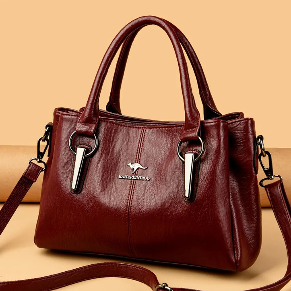 Leather handbag with detachable shoulder strap